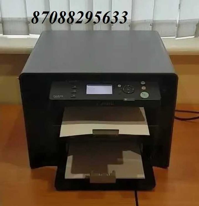 Принтер марки Canon MF4410  МФУ - принтер 3 в 1
