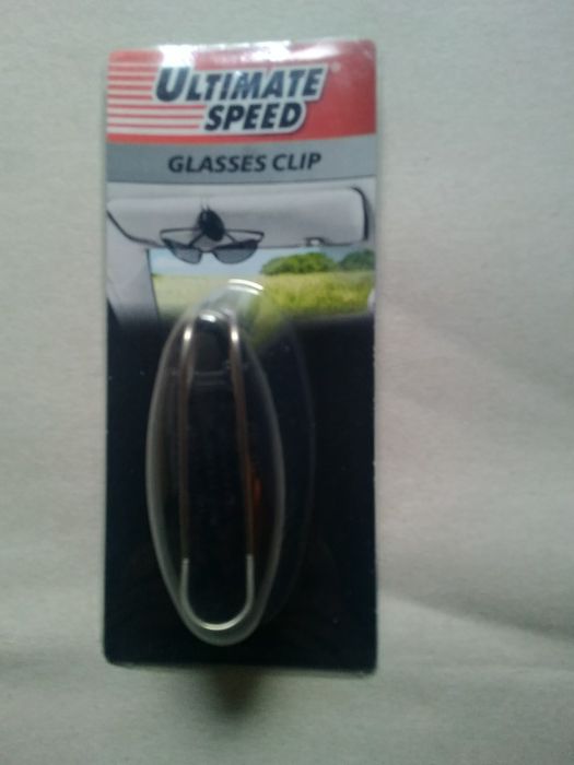 Suport pentru ochelari cu prindere la parasolar Ultimate Speed