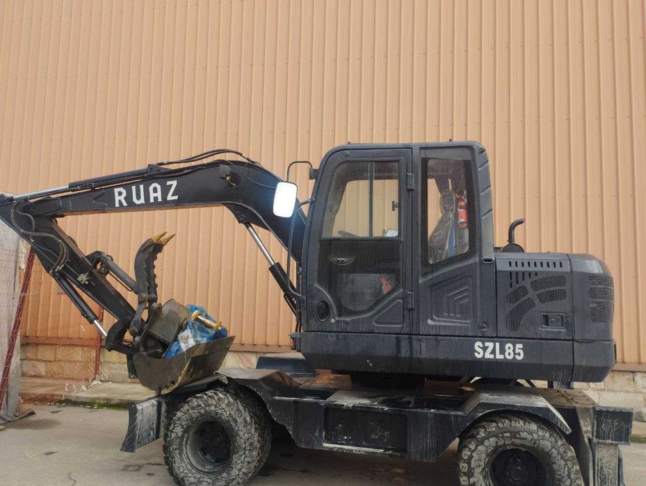 Экскаватор колёсный 0.3 куб