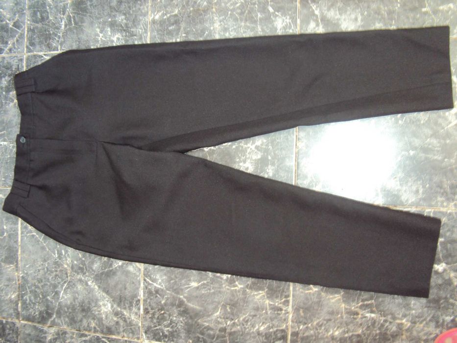 Брюки школьные девочке .