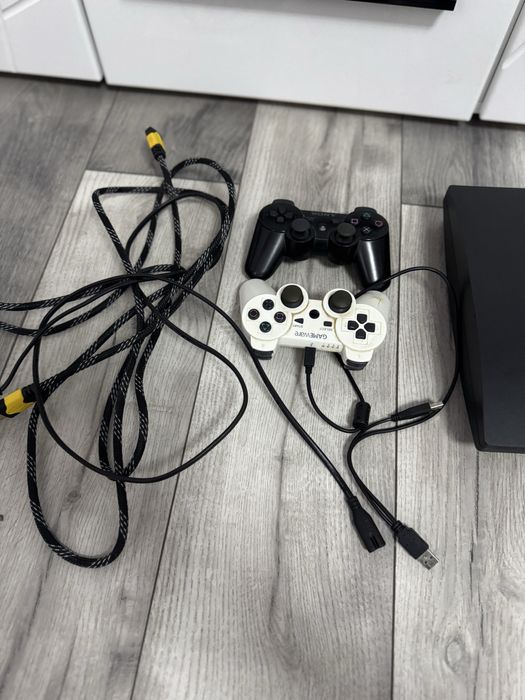 Vand Play Station 3 + 15  jocuri