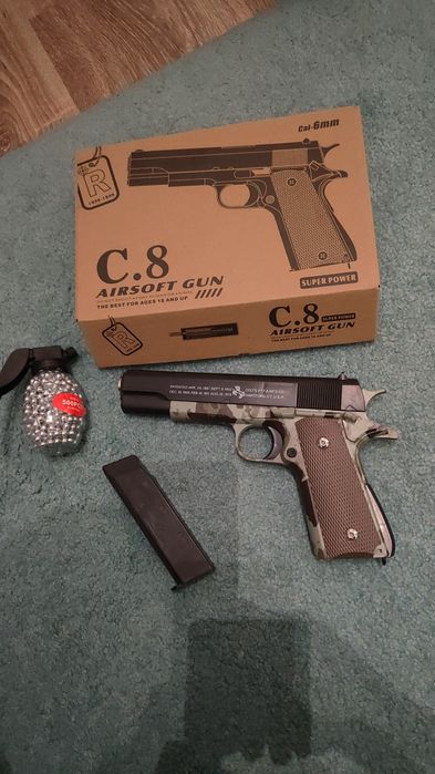 Pistol cu bile propulsie arc + 500bile plastic abs