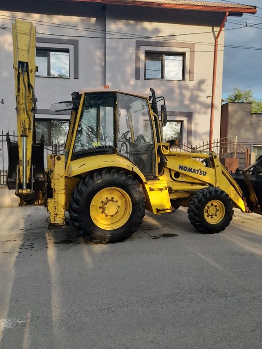 Buldoexcavator komatsu 93 r