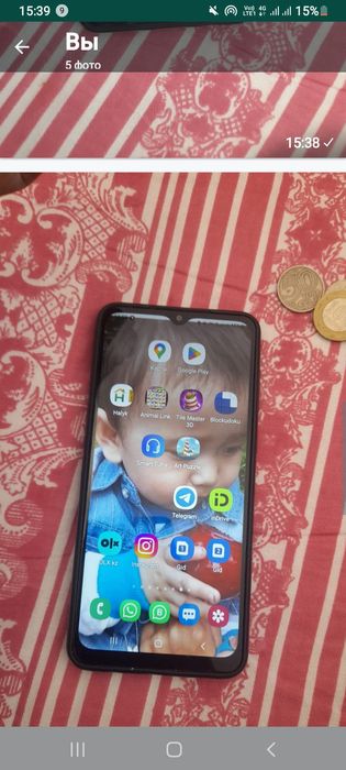 Телефон сатылады