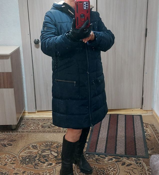 Продам пуховик 48 размер
