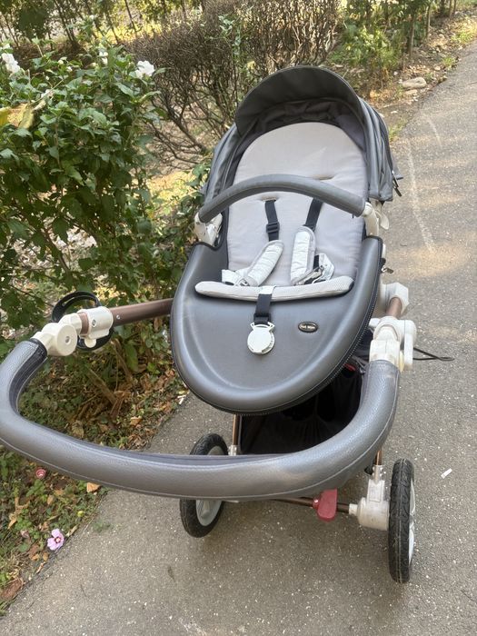 Carut bebe cu landou si scoica