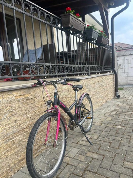 Vând bicicleta de fete BTwin cu roti de 24