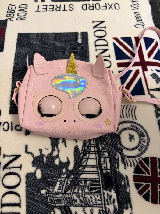 Purse gentuta interactiva pets