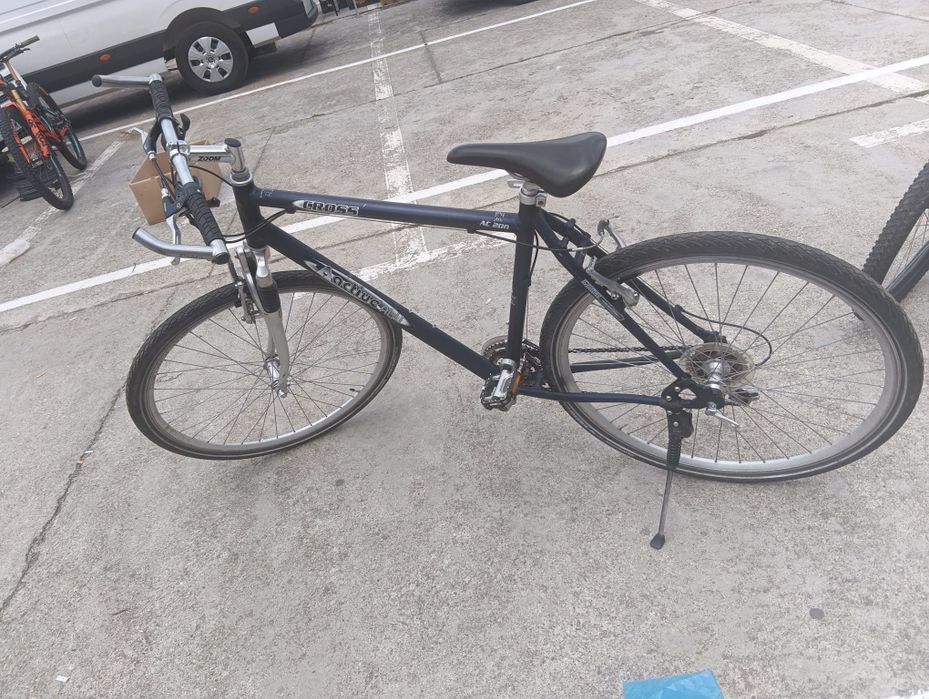 Vând Bicicletă  Hibrid
