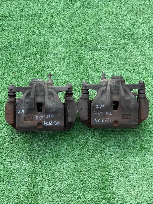 Суппорт тормозной передний Toyota Estima  ACR50,55