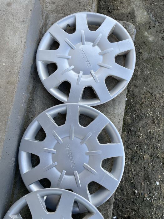 Vand 4 jante cu 2 cauciucuri 185 60 15 iarna , capace originale dacia