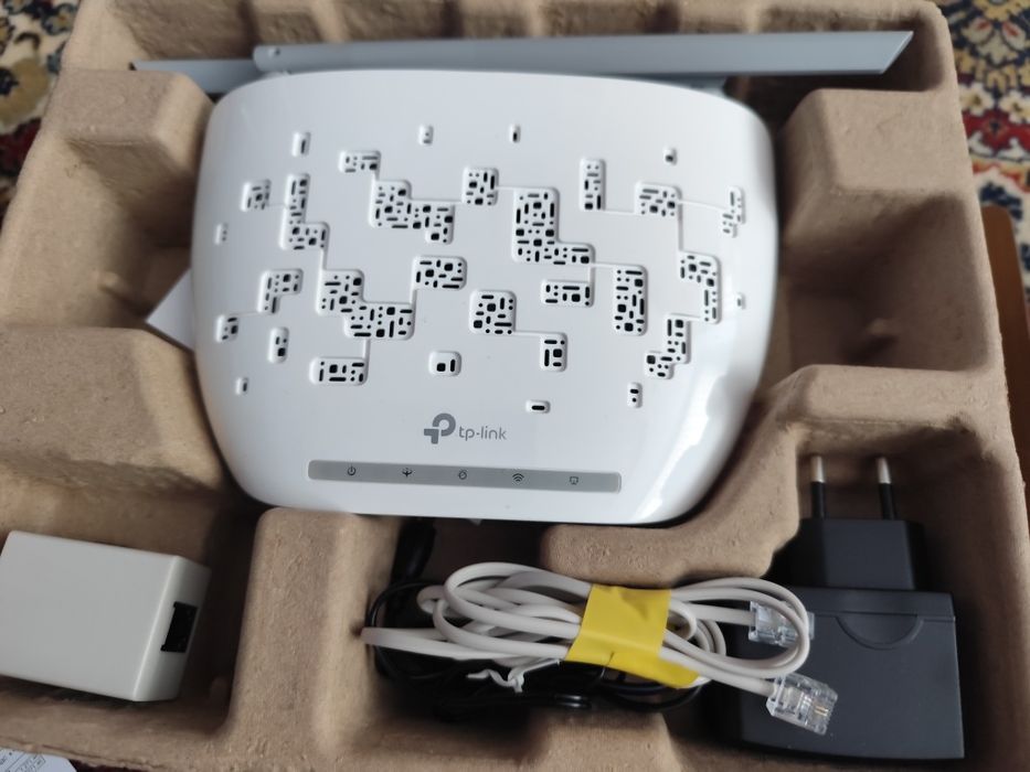 Модем - Роутер  TP link ADSL новый в работе не был.