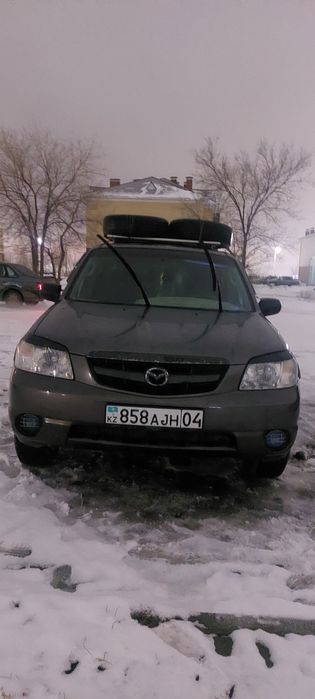 Мазда трибьют 3 литра