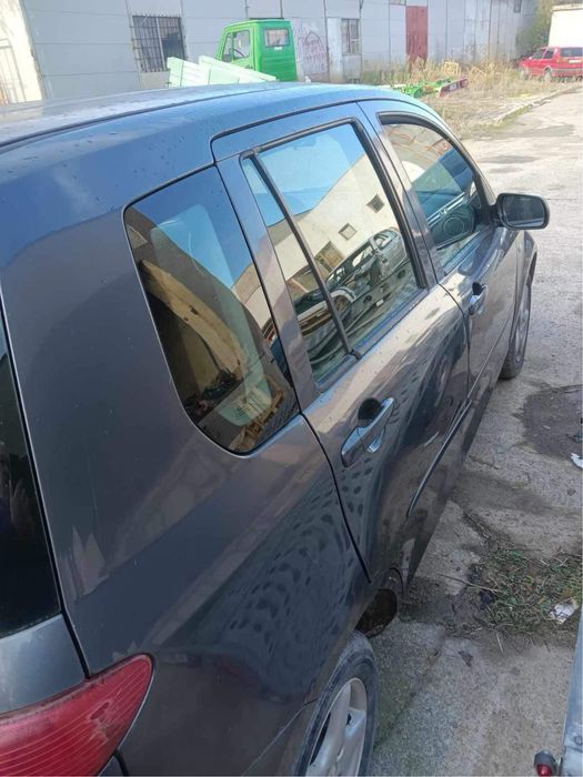 Mazda 2 - на части