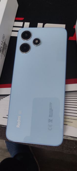 Redmi 12 5G 1 an folosit