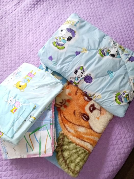 Постель в детскую кроватку.