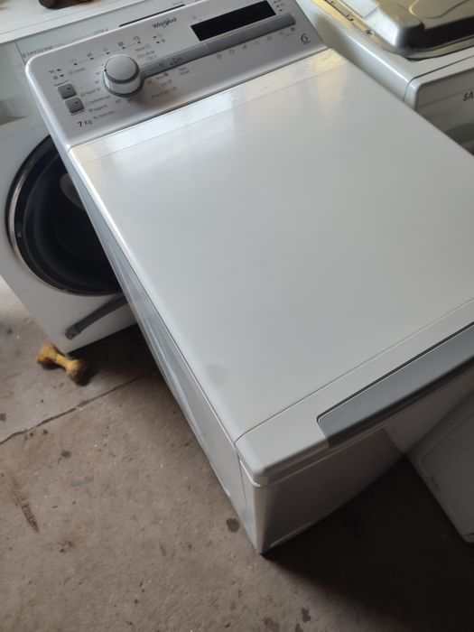 Vând masina de spălat verticala 390 Ron