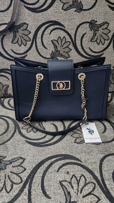 Geanta DKNY și Polo Ralph Lauren