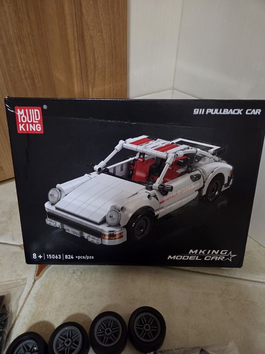 Чисто нов комплект за конструиране на модел кола Mould King 911 Pull-B