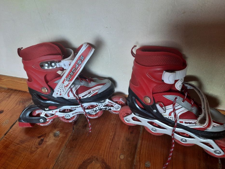 Роликовые коньки