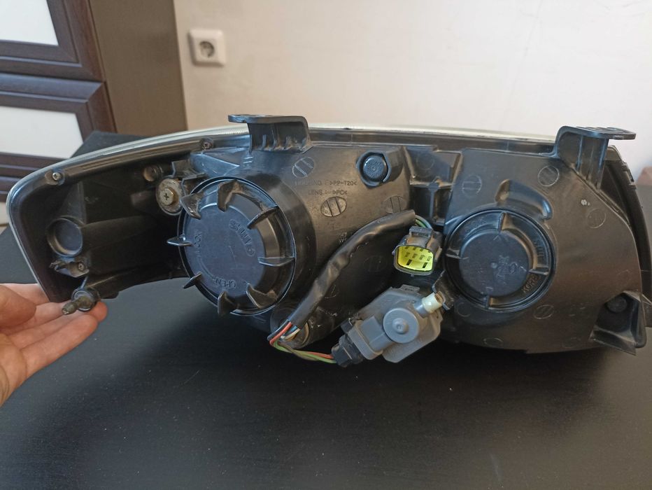 Фара Ниссан Альмера Классик оригинал