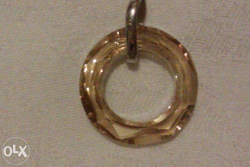 Swarovski модел обеци и медальони