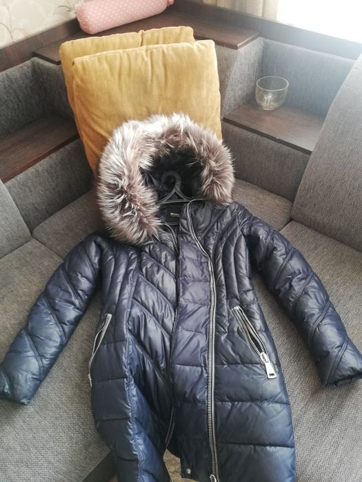 Продаю Женский пуховик.