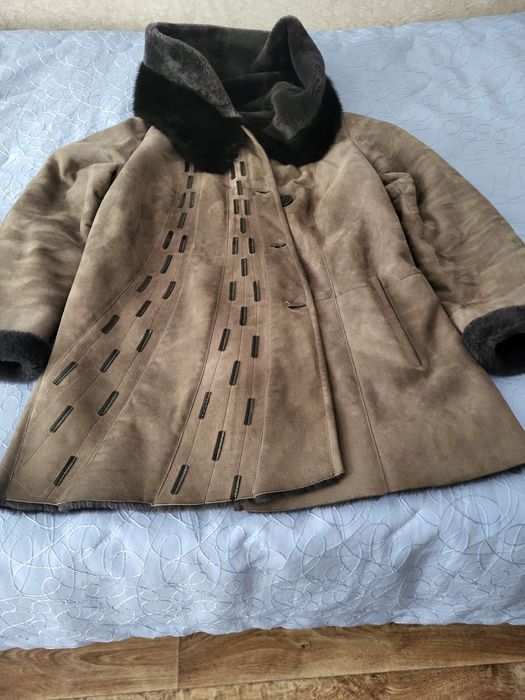 Продам верхнюю  одежду