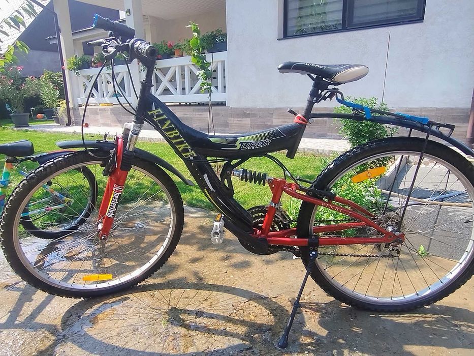 Bicicleta  adult și copil