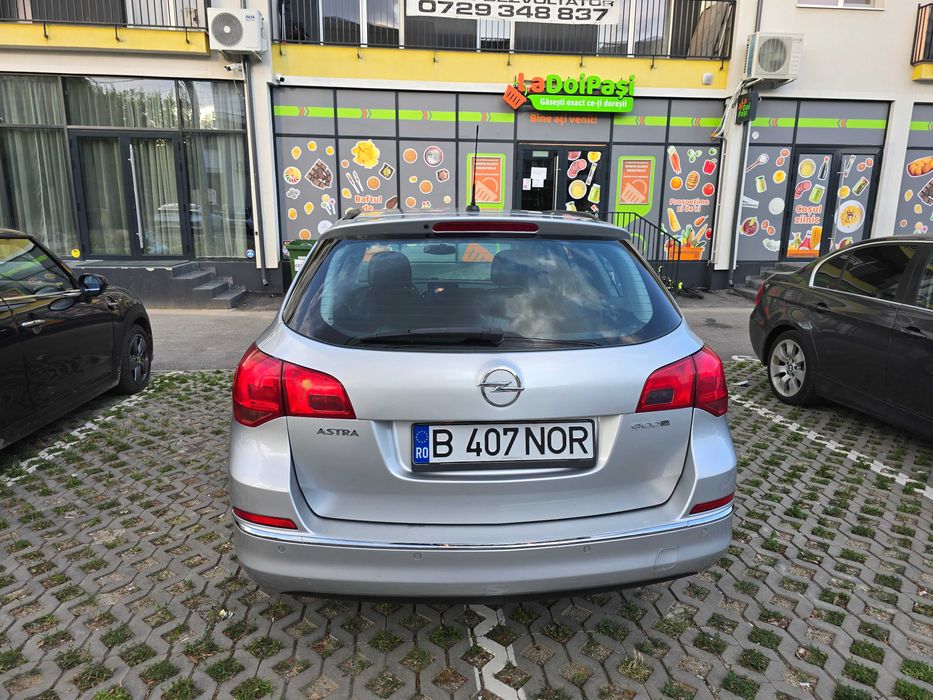 Opel Astra J Sports Tourer 2015 1.6 diesel  | Stare  buna |  2 seturi Anvelope + 2 seturi Jante Incluse | Carplay Android  |