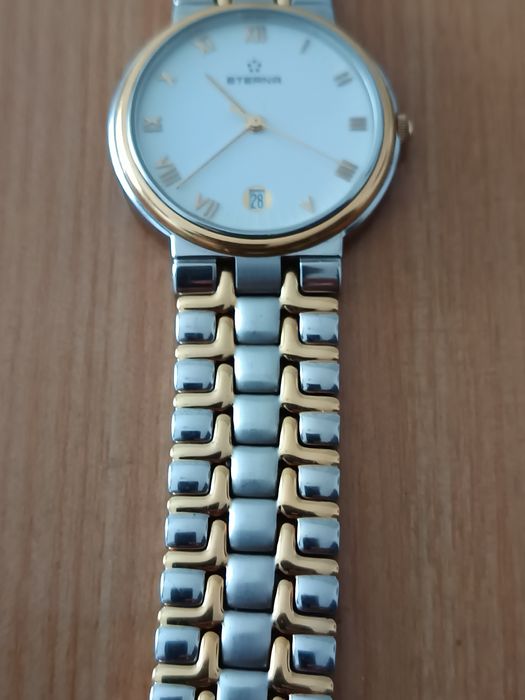 Ceas eterna aur-otel