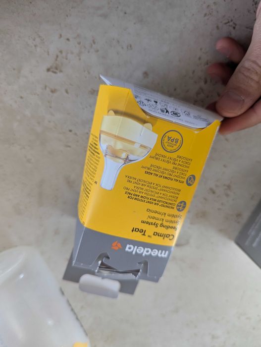 Помпа за кърма Medela и комплект шишета и биберони
