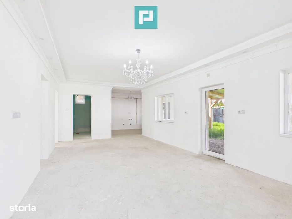 Casă renovată 4 camere si 1452 mp teren în Bătania