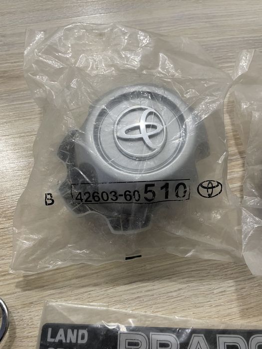 Колпаки заглушки, эмблема , наклейки на Тойота Прадо