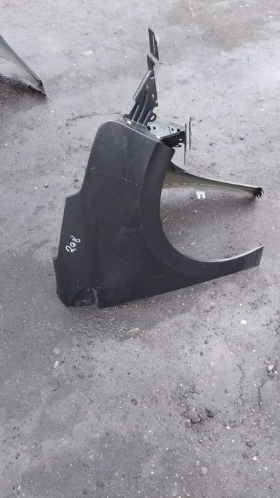 Aripa stanga/dreapta Peugeot 208 an 2012