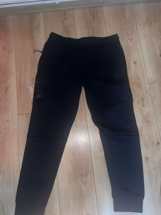 Pantaloni Nike Tech bleumarin