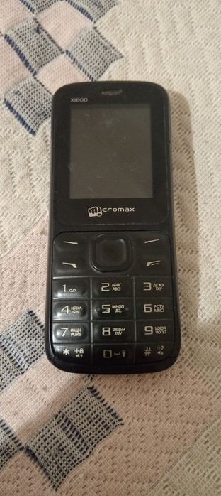 micromax x1800 кнопочный телефон.