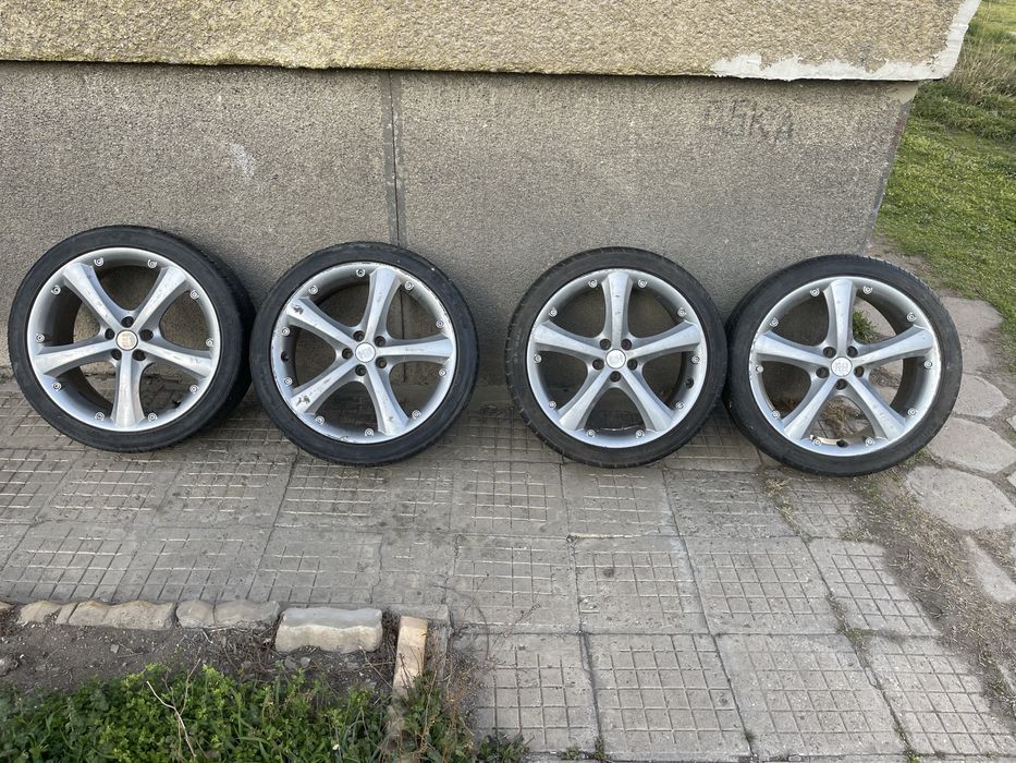 Джанти с гуми RH 18 5x112 63.6мм=57.1mm ET35 цен.отвор VW AUDI VAG
