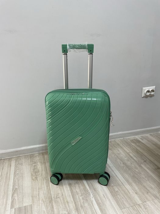 Маленкие новые чемоданы