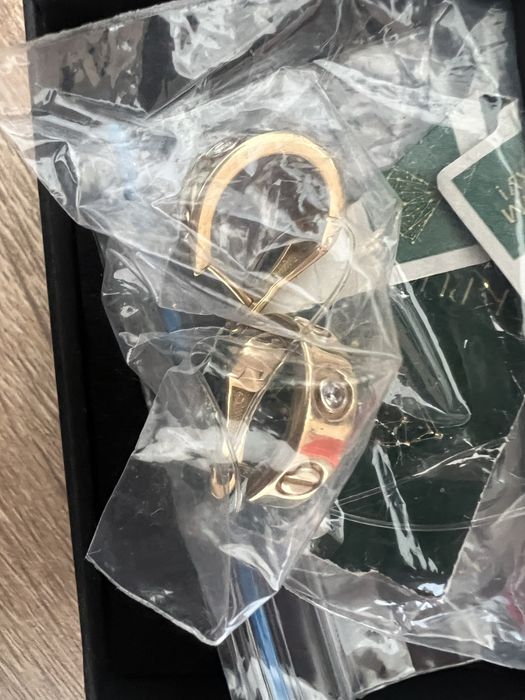 Золотые сережки Cartier