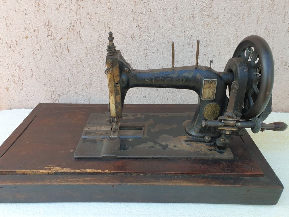 Mașină de cusut Singer