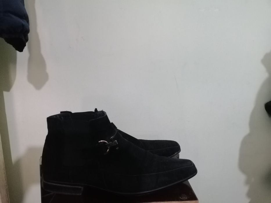 Продам фирменные сапоги.