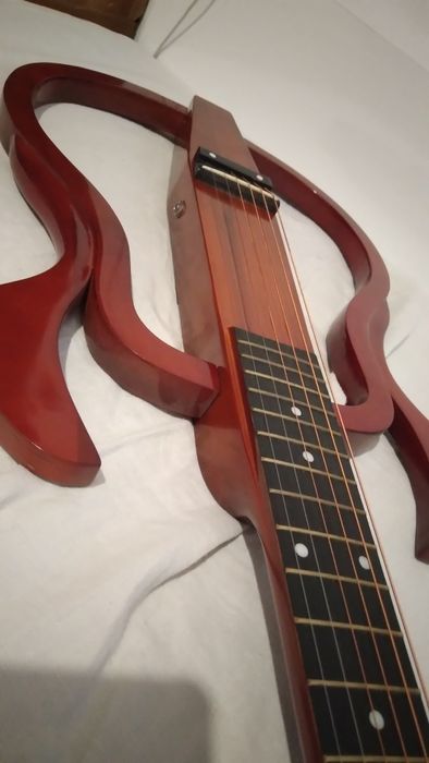 Китара Ел. Qojing