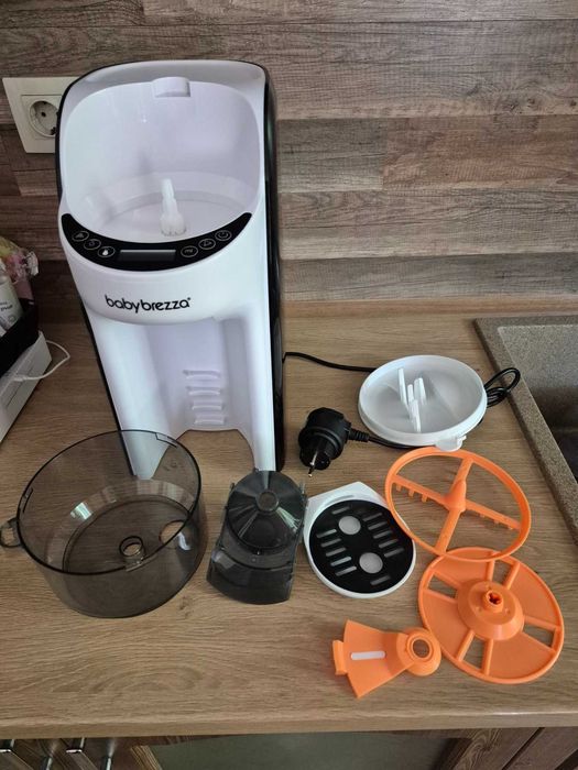 Baby Brezza pro advance машина за мляко