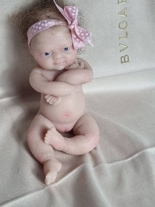 Mini bebelus din silicon . Stanta. Original