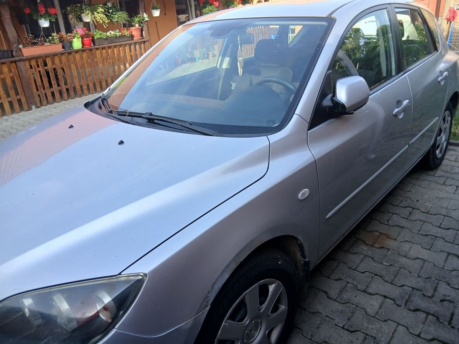 Vând  Mazda 3  anul 2008