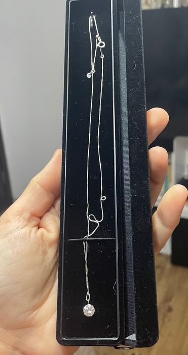 Lanț din platina avand un pandant cu diamant natural