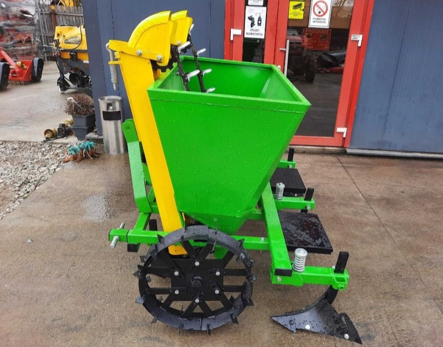 Masina de pus cartofi 2 randuri+fertilizator