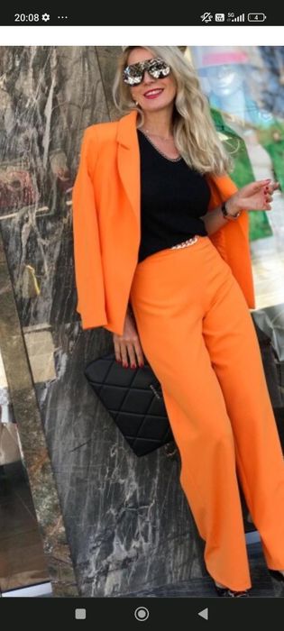 Нов костюм 44 размер