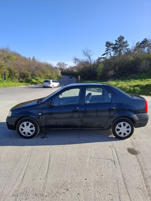 Dacia logan 2006, 1,4L benzina, 70000km, servo total,geamuri electrice